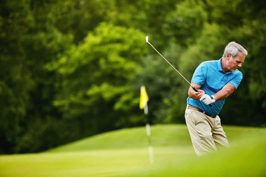 Client enjoying a round of golf after selling his business